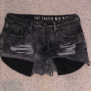black distressed shorts